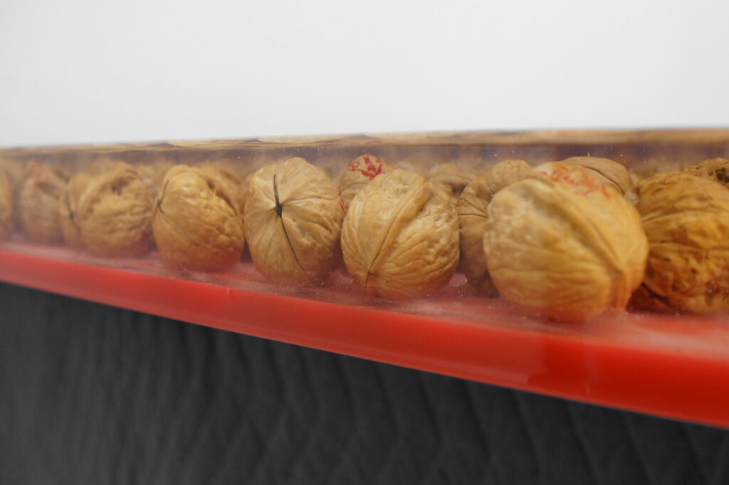 http://Epoxy%20Countertop%20With%20Embedded%20Walnuts%201913%203